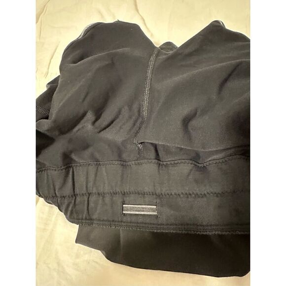 Lululemon Run Breeze size 8 black skirt. Shorts under with pockets. - Picture 7 of 9